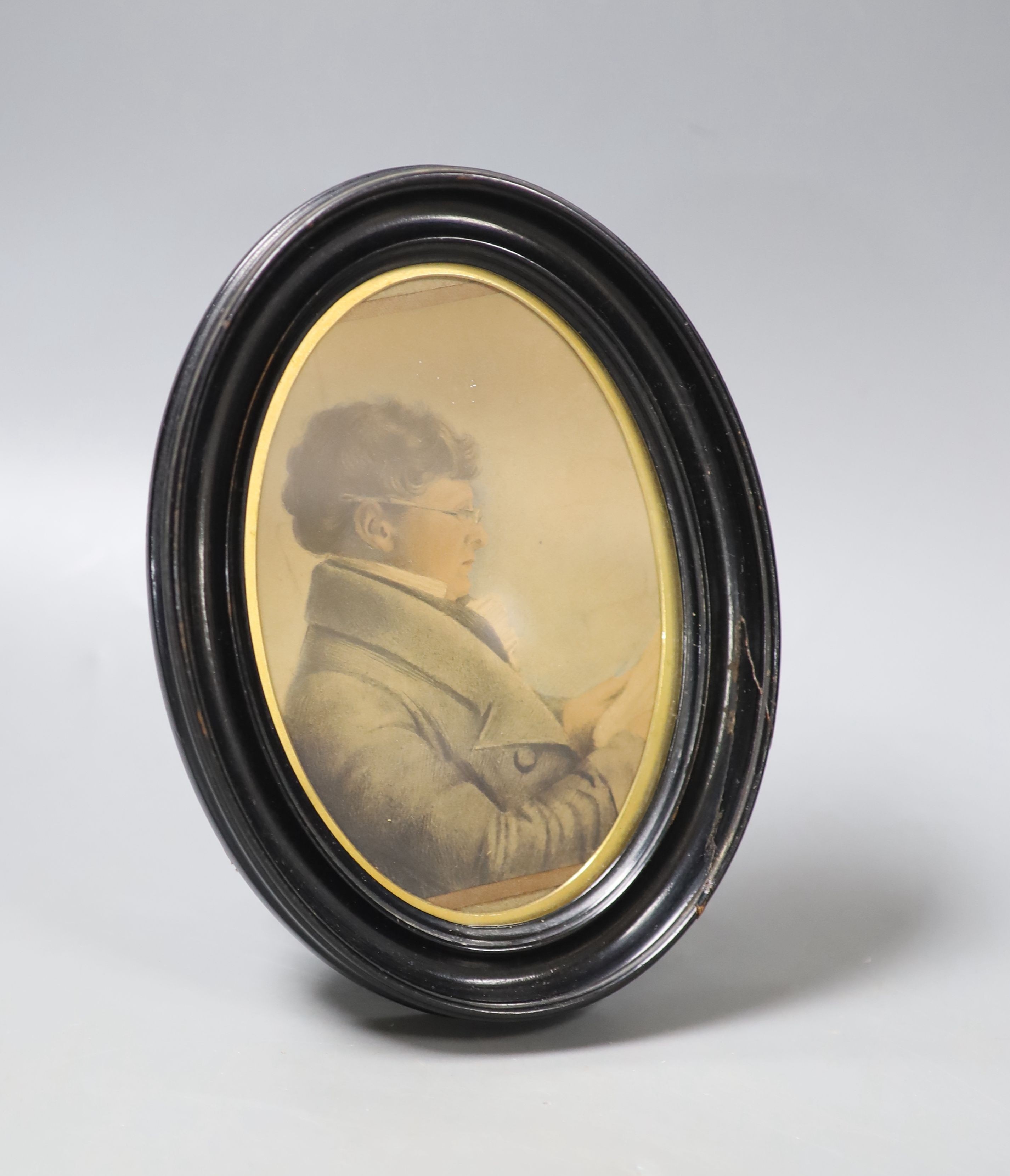 A miniature portrait of a gentleman reading, in a Walter Jones of Sloane Street frame, 1890's, height 15cm